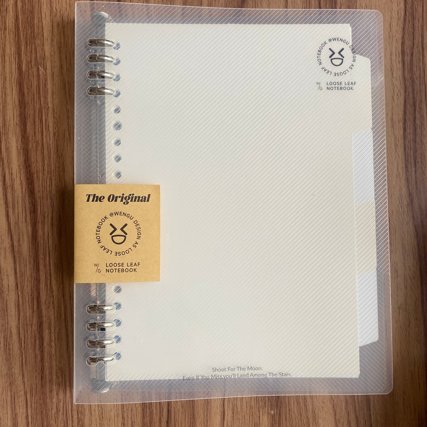 Cuaderno infinito "transparente" A5 8 anillas-50 hojas rayadas+4 separadores