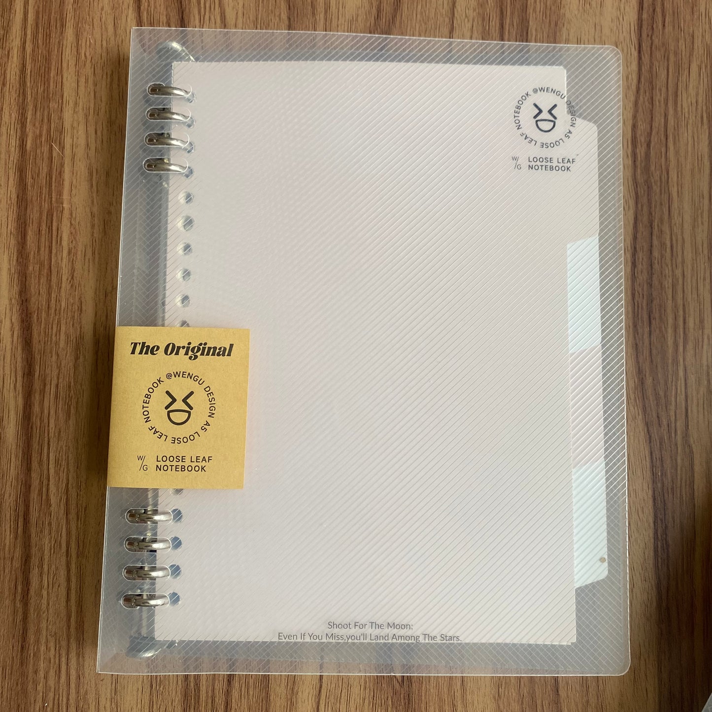 Cuaderno infinito "transparente" A5 8 anillas-50 hojas rayadas+4 separadores