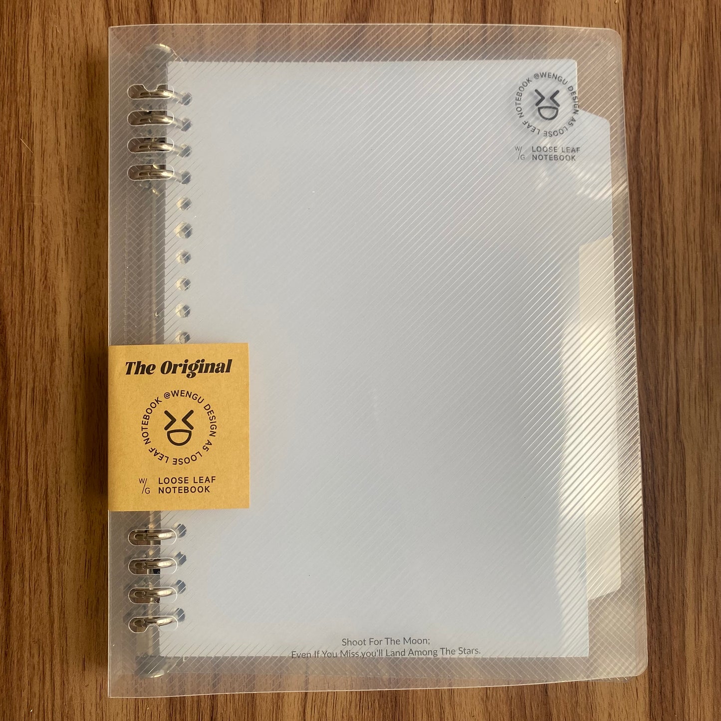 Cuaderno infinito "transparente" A5 8 anillas-50 hojas rayadas+4 separadores
