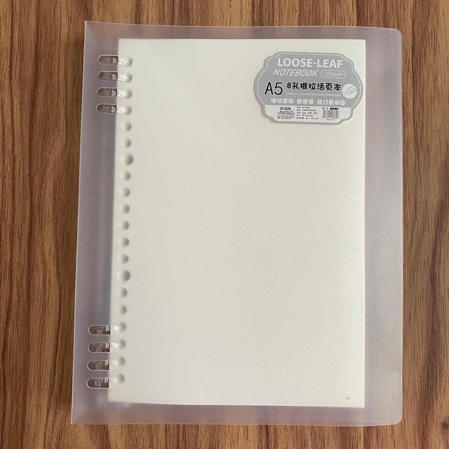 Cuaderno infinito "transparente" A5 8 anillas-50 hojas blancas
