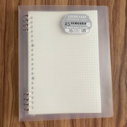 Cuaderno infinito "transparente" A5 8 anillas-50 hojas cuadriculado