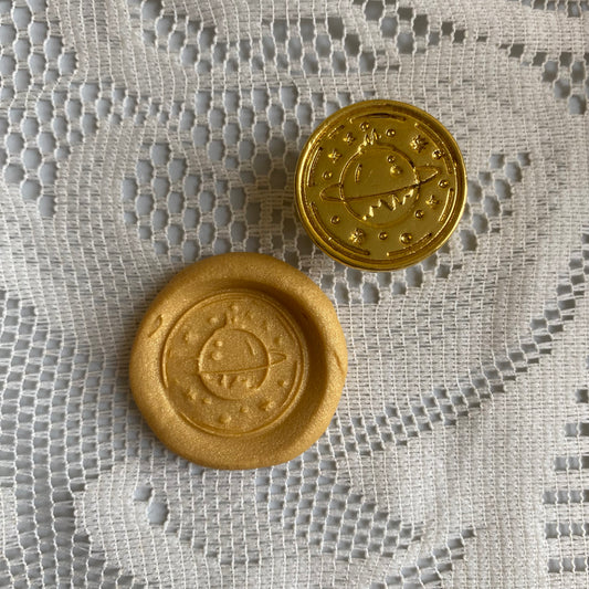 Bronce prediseñado "planeta" 2.5 cm