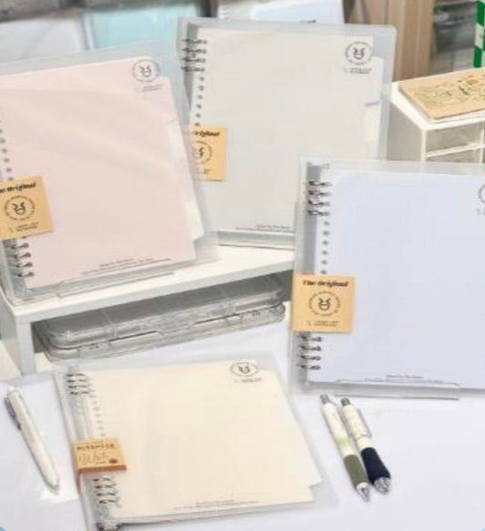 Cuaderno infinito "transparente" A5 8 anillas-50 hojas rayadas+4 separadores